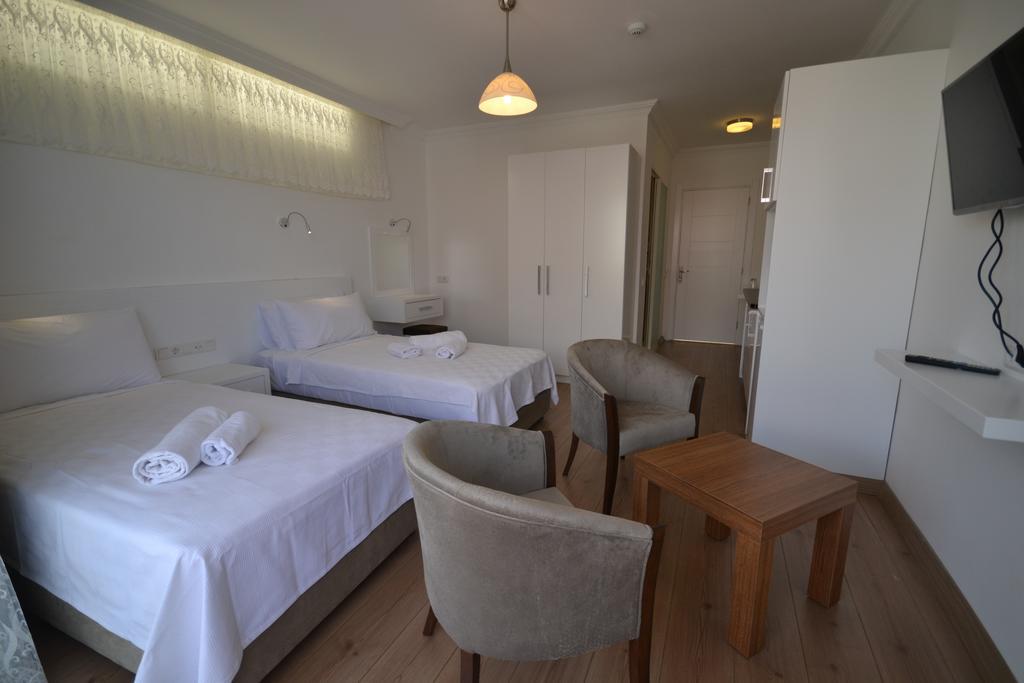 Kelebek Studio Apartments Kalkan Szoba fotó